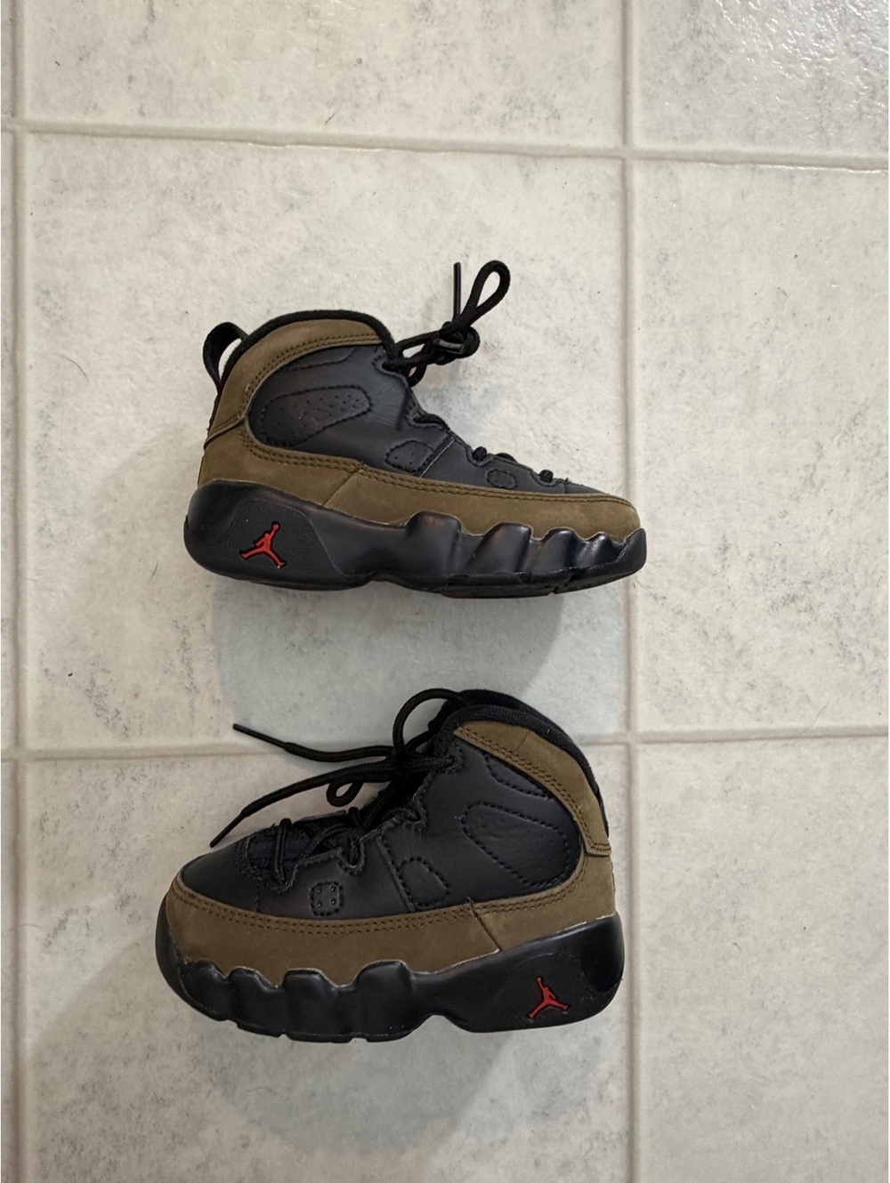 Jordan olive and black high top sneakers